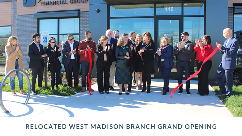 A group of JFG associates standing in front of the new Madison West Towne branch.